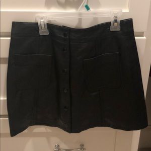 Black leather skirt.